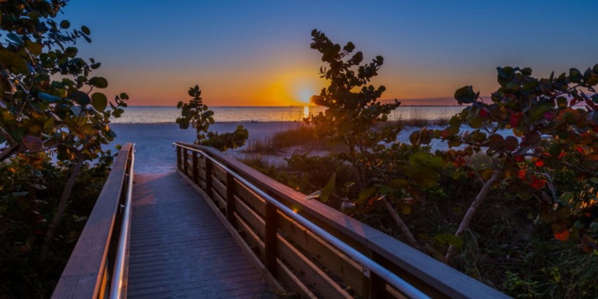 Footbridge to the beach at Sunset Florida USA